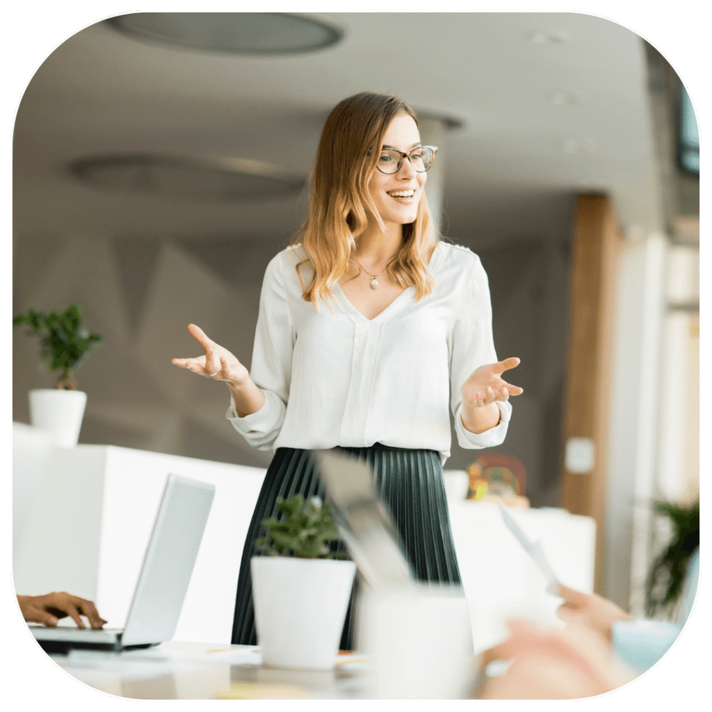 Young woman speaking confidently in English at work.